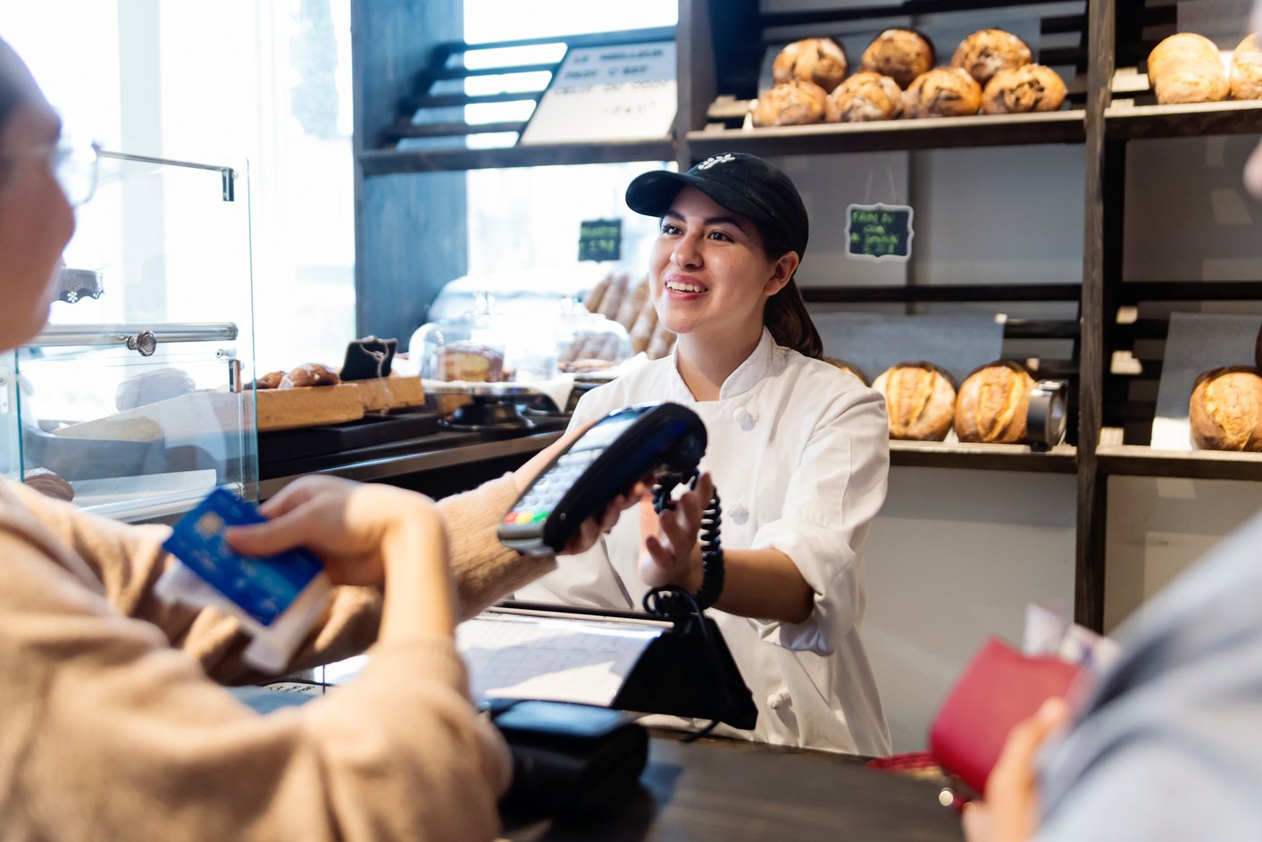 Customer service in a small local bakery shop.